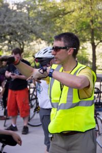 Cyclist giving instructions